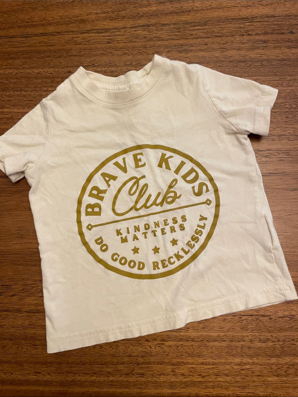 Cream Tee with Gold Emblem